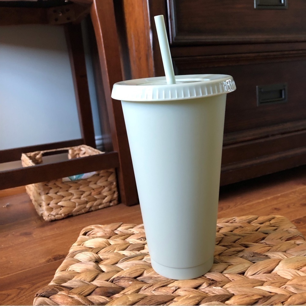 mint green reusable cup with lid and straw (comes with pack of Disney Stickers)